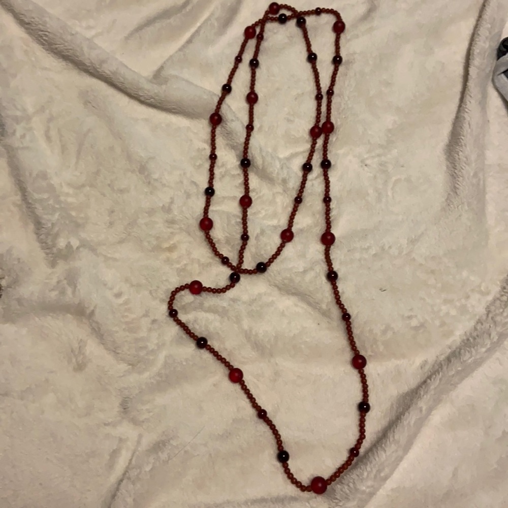 Long dark red necklace
